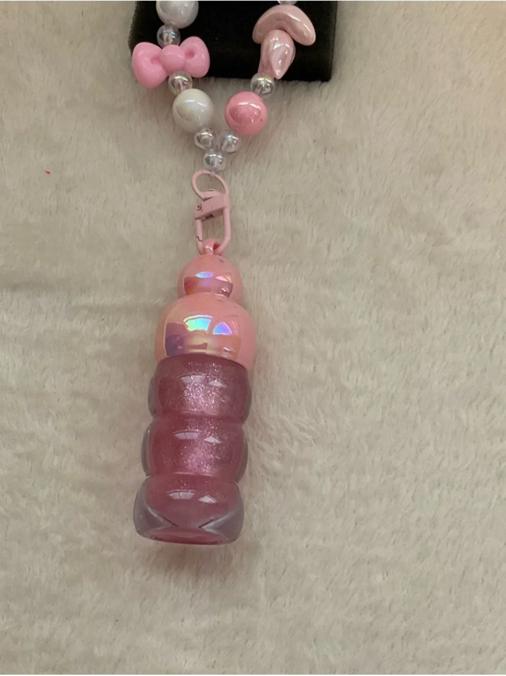 Bracelet with charms and Lip Gloss